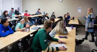 Students in sports management class lecture