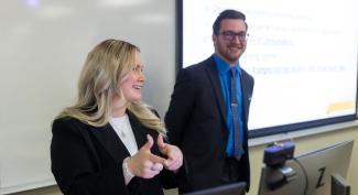 UW-Platteville marketing students are giving a group presentation in front of class.