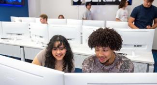 Two UW-Platteville students collaborate in computer lab