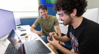 Two UW-Platteville computer science students collaborate on a project