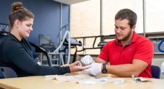 UW-Platteville Health and Human Performance students practice glucose testing