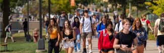UW-Platteville students walk across campus between classes