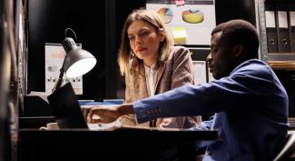 team discussing criminology report