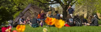 UW-Platteville students in a group in springtime outdoor class