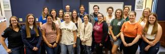 UW-Platteville student participating in Professional Mentor Program pose for group photo 
