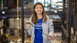 Leah Norgal, senior, mechanical engineering with her Easy Zip prototype